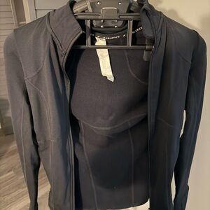 Women's Black Sport Jacket tight zip up Fabletics